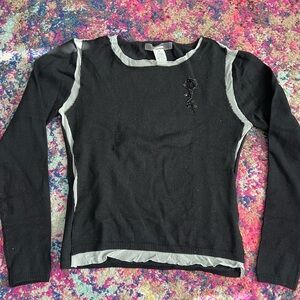 Elegant Black Top with Floral Embellishment